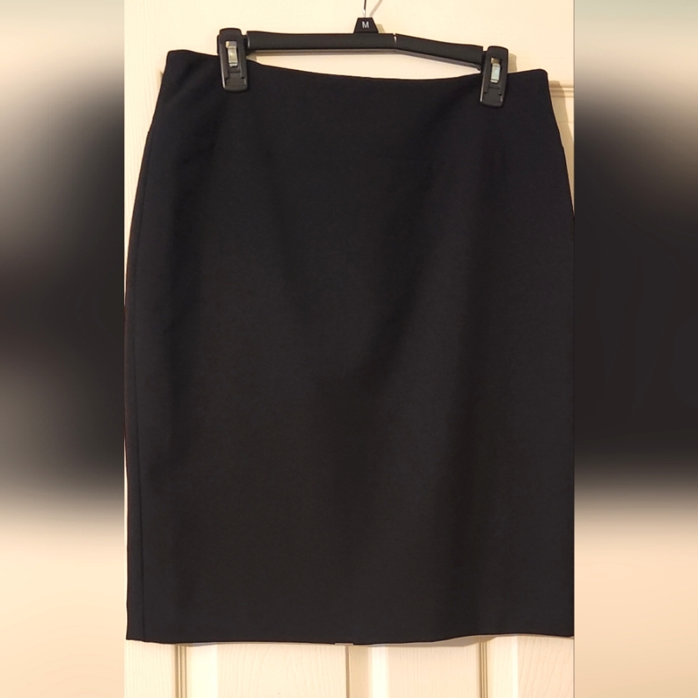 Classic mid length wide waistband skirt
